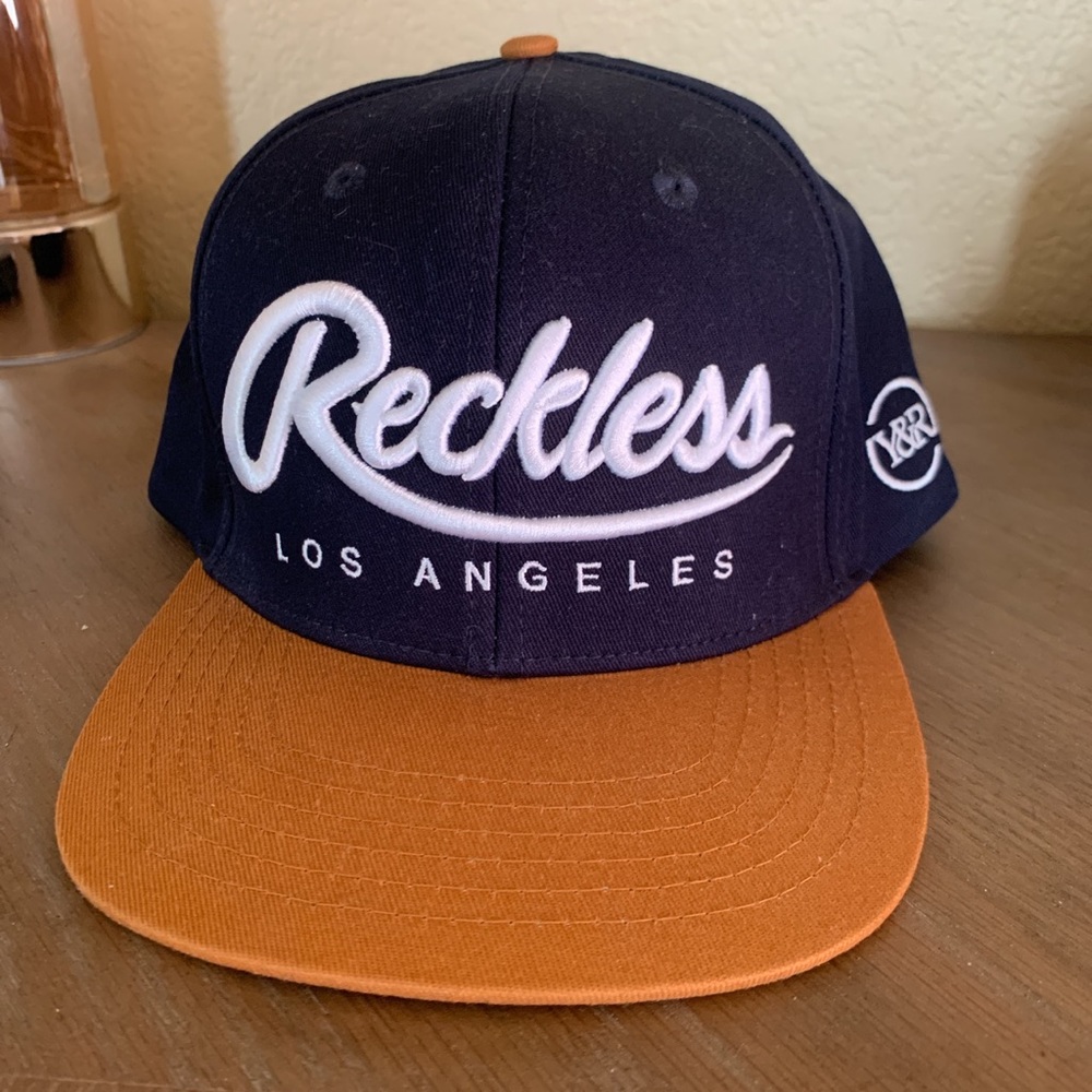 Men’s Young and Reckless Hat Adjustable- New
